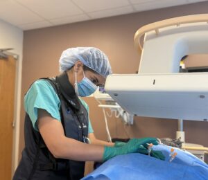 A fellow from the Montefiore Medical Center Multidisciplinary Pain Medicine Fellowship perform an interventional procedure during training. 