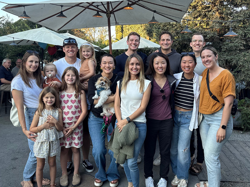 Members of the Stanford Pain Medicine and their families pose at an event.